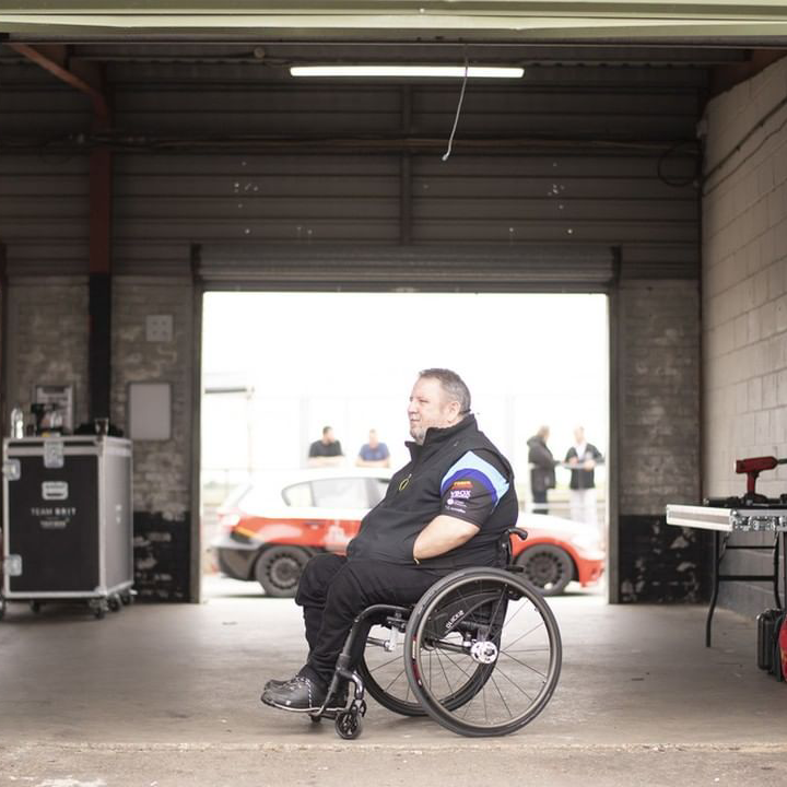 Team Brit team member in wheelchair wide shot